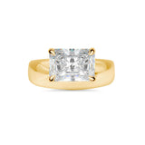 Radiant Cut diamond on a domed cigar ring