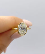 Unique Bezel Set Engagement Ring | Oval Cut