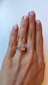 Five Stone Emerald Cut Ring with Bezel Set Baguettes