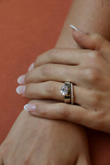 Deltora Diamonds Floating East West Oval Cigar Band Engagement Ring made with Sustainable Lab Diamonds.