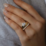 Deltora Diamonds Floating East West Oval Cigar Band Engagement Ring made with Sustainable Lab Diamonds.