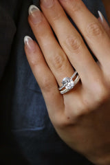 Oval Cut Four Claw Pavé Band Engagement Ring with Sustainable Lab Diamonds.