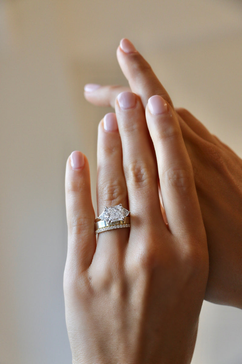 Princess Cut Engagement ring with trilliant side stones setting