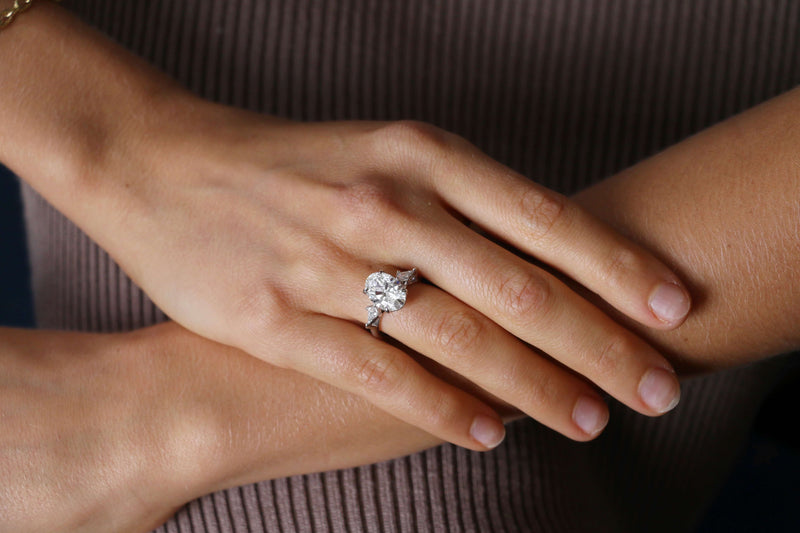 Oval Cut with Kite Side Stones and Hidden Halo Setting