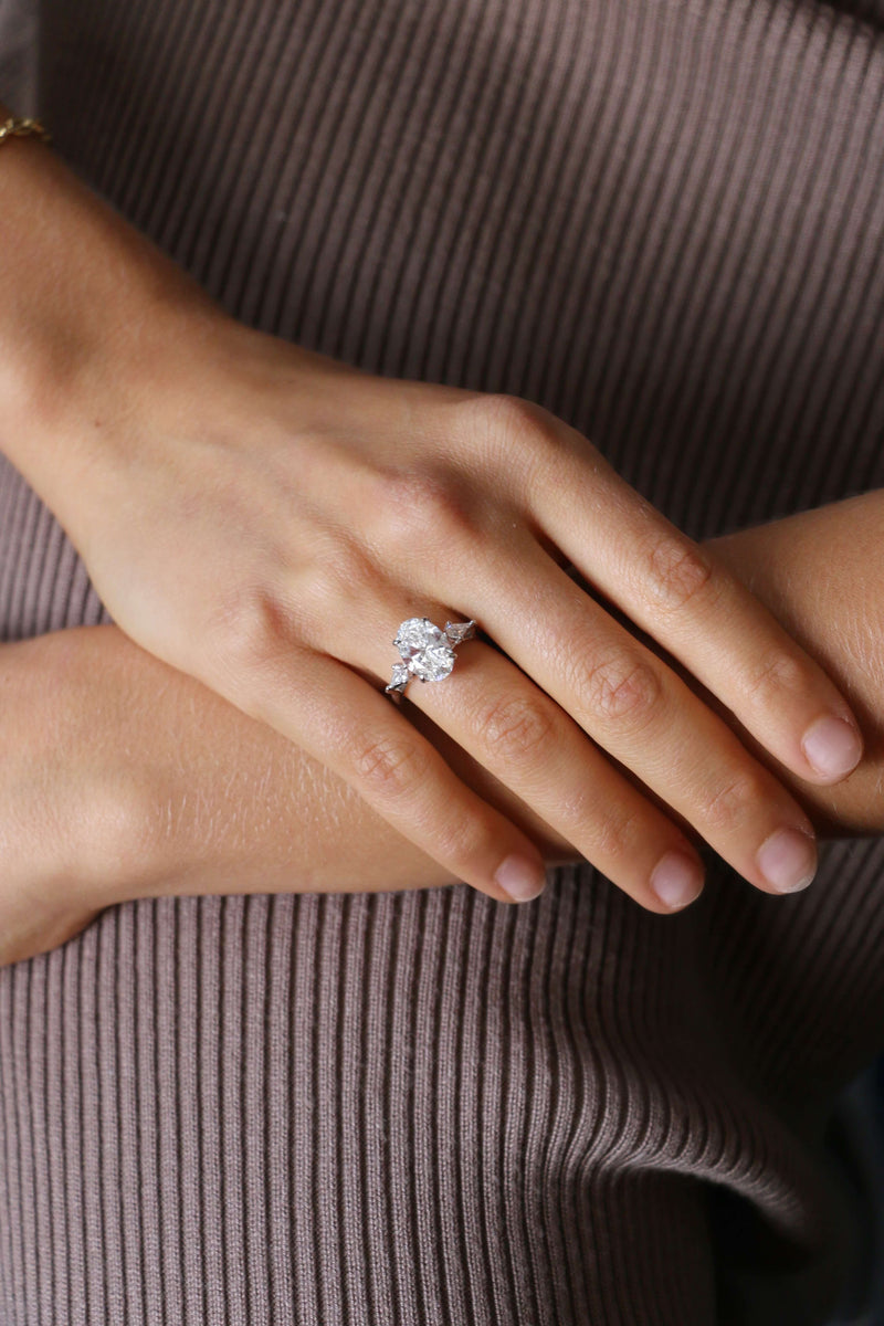 Oval Cut with Kite Side Stones and Hidden Halo Setting